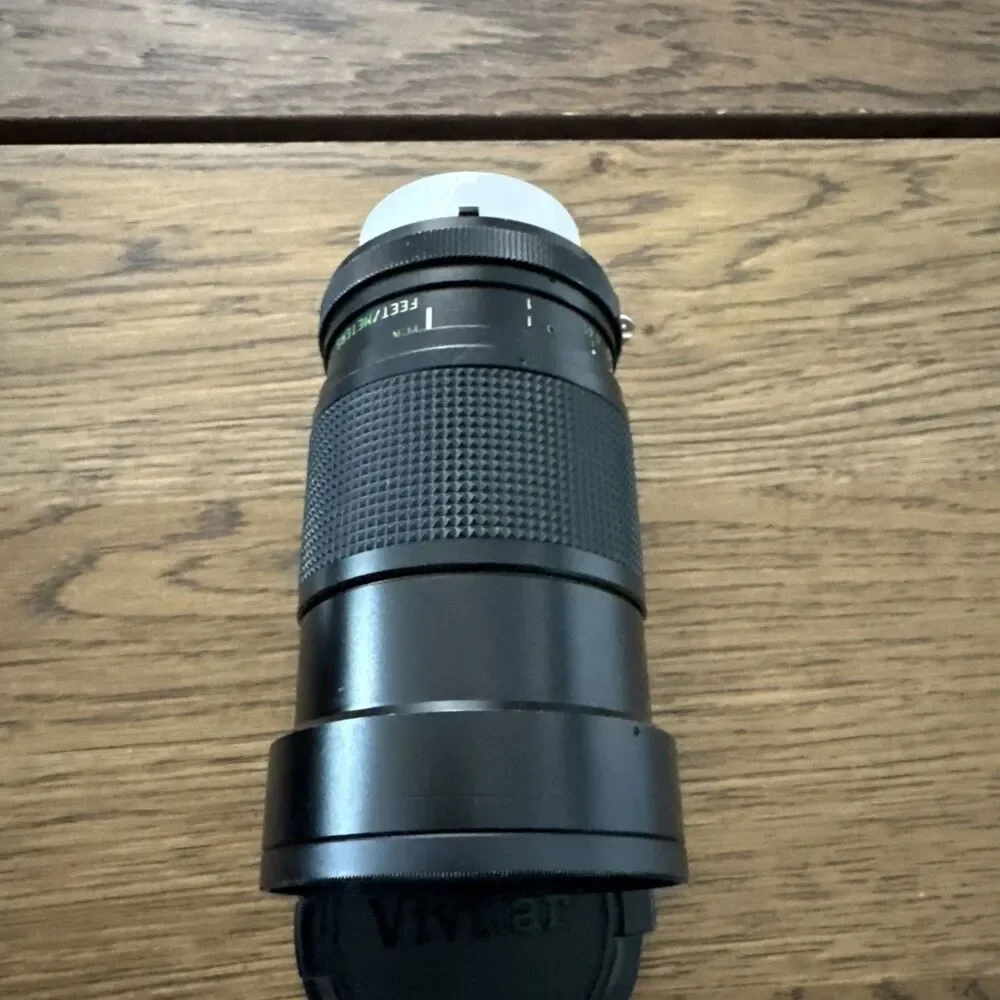 vintage Vivitar 28-85mm f/2.8-3.8 MC macro focusing camera lens.